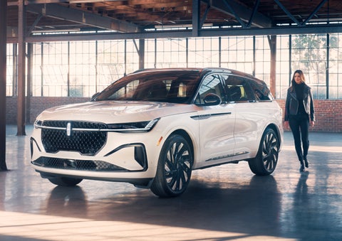 A person approaches a 2024 Lincoln Nautilus® SUV. | Astro Lincoln in Pensacola FL