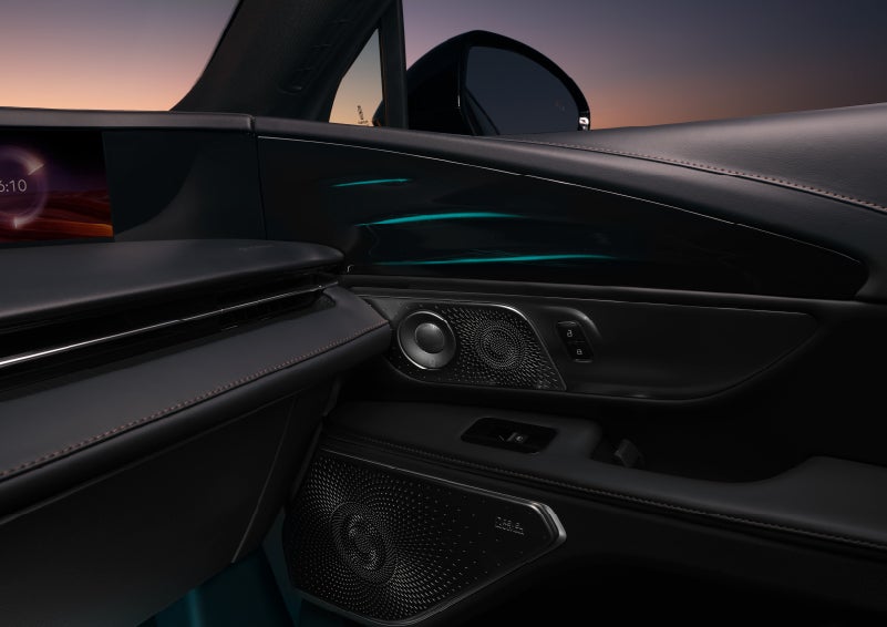 Selectable ambient lighting glows in the passenger door panel. | Astro Lincoln in Pensacola FL