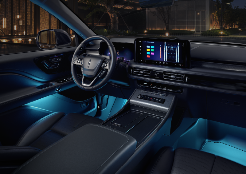Deep blue ambient lighting glows from various places within a 2025 Lincoln Aviator® SUV. | Astro Lincoln in Pensacola FL