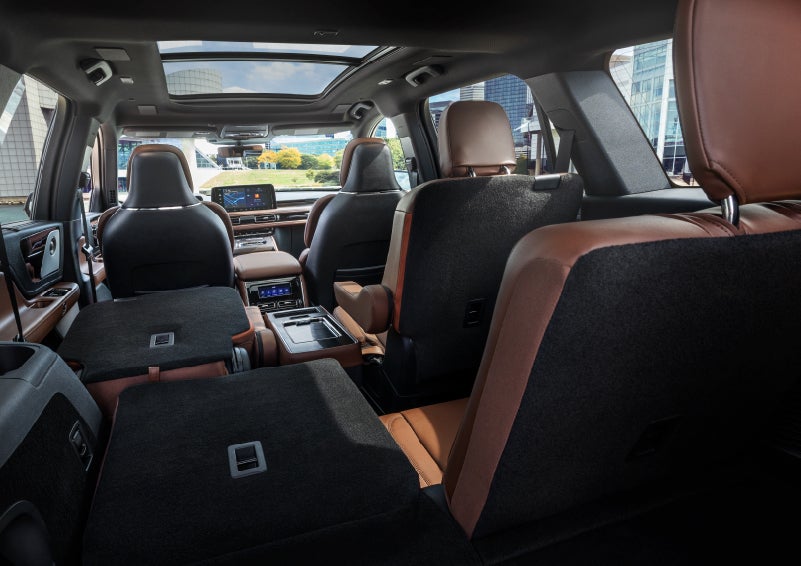 The interior of the 2025 Lincoln Aviator® SUV is shown with two seats folded down for added space. | Astro Lincoln in Pensacola FL