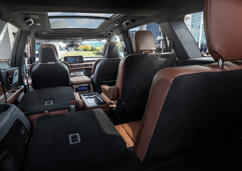 The interior of the 2025 Lincoln Aviator® SUV is shown with two seats folded down for added space. | Astro Lincoln in Pensacola FL