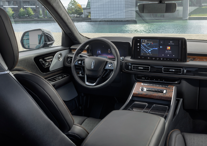 The interior of the 2025 Lincoln Aviator® SUV is shown parked with a view of a harbor through the windshield. | Astro Lincoln in Pensacola FL