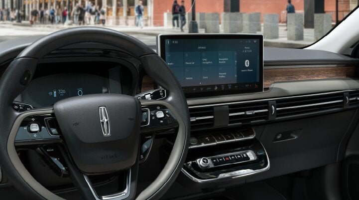 The center screen of the new 2025 Lincoln Corsair® SUV is showcased with its SYNC® 4 capabilities highlighted | Astro Lincoln in Pensacola FL