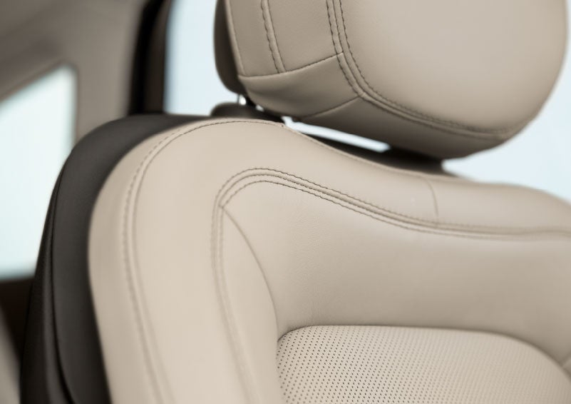 Fine craftsmanship is shown through a detailed image of front-seat stitching. | Astro Lincoln in Pensacola FL