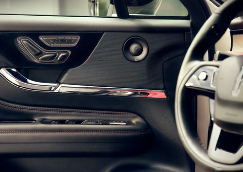 The driver of a 2024 Lincoln Corsair® SUV is shown selecting the drive mode. | Astro Lincoln in Pensacola FL