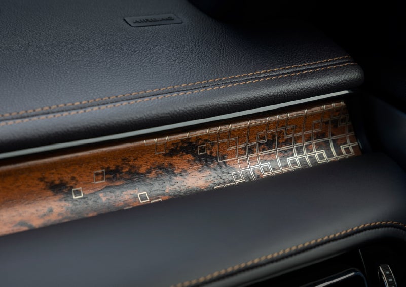 A close-up shot of the 2026 Lincoln Aviator® dashboard with unique black and brown accents and brown stitching. | Astro Lincoln in Pensacola FL
