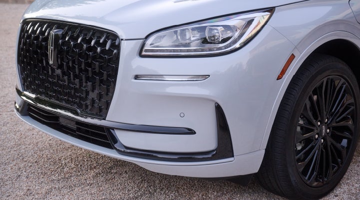 The all-black grille of the available Jet Appearance Package on a 2026 Lincoln Corsair® SUV is shown. | Astro Lincoln in Pensacola FL