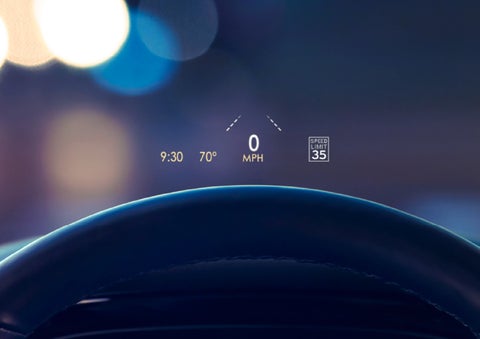 Useful driver information is being projected in front of the steering wheel on the windshield via the available head-up display. | Astro Lincoln in Pensacola FL