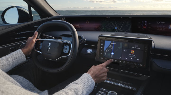 The driver of a 2026 Lincoln Nautilus® SUV interacts with the new Lincoln Digital Experience. | Astro Lincoln in Pensacola FL