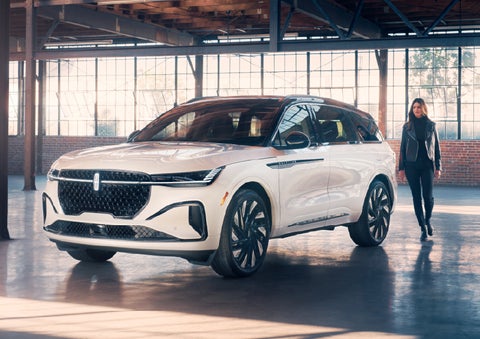 A person approaches a 2026 Lincoln Nautilus® SUV. | Astro Lincoln in Pensacola FL