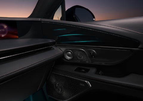 Selectable ambient lighting glows in the passenger door panel. | Astro Lincoln in Pensacola FL