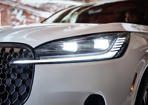A close-up of a headlamp on the 2027 Lincoln Aviator® SUV is shown. | Astro Lincoln in Pensacola FL